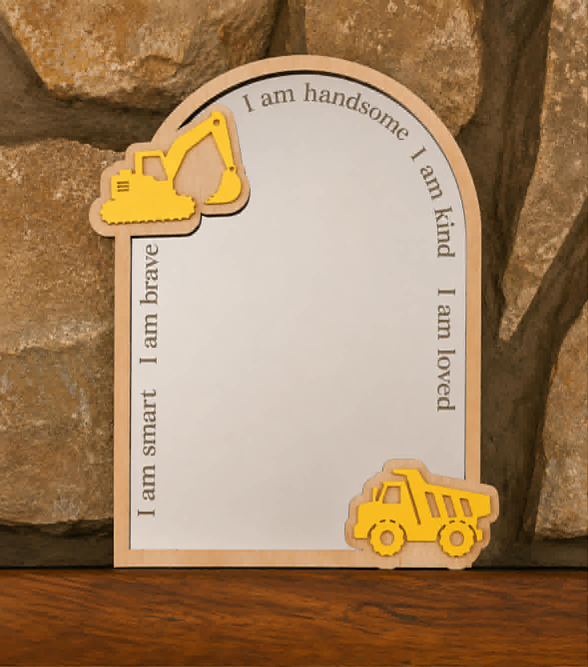 Personalised construction-themed acrylic affirmation mirror featuring an excavator, dump truck and engraved positive affirmations for a child's bedroom