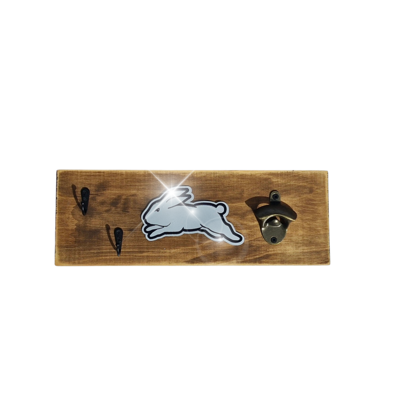 Wooden wall-mounted bottle opener with rabbit design on a white background