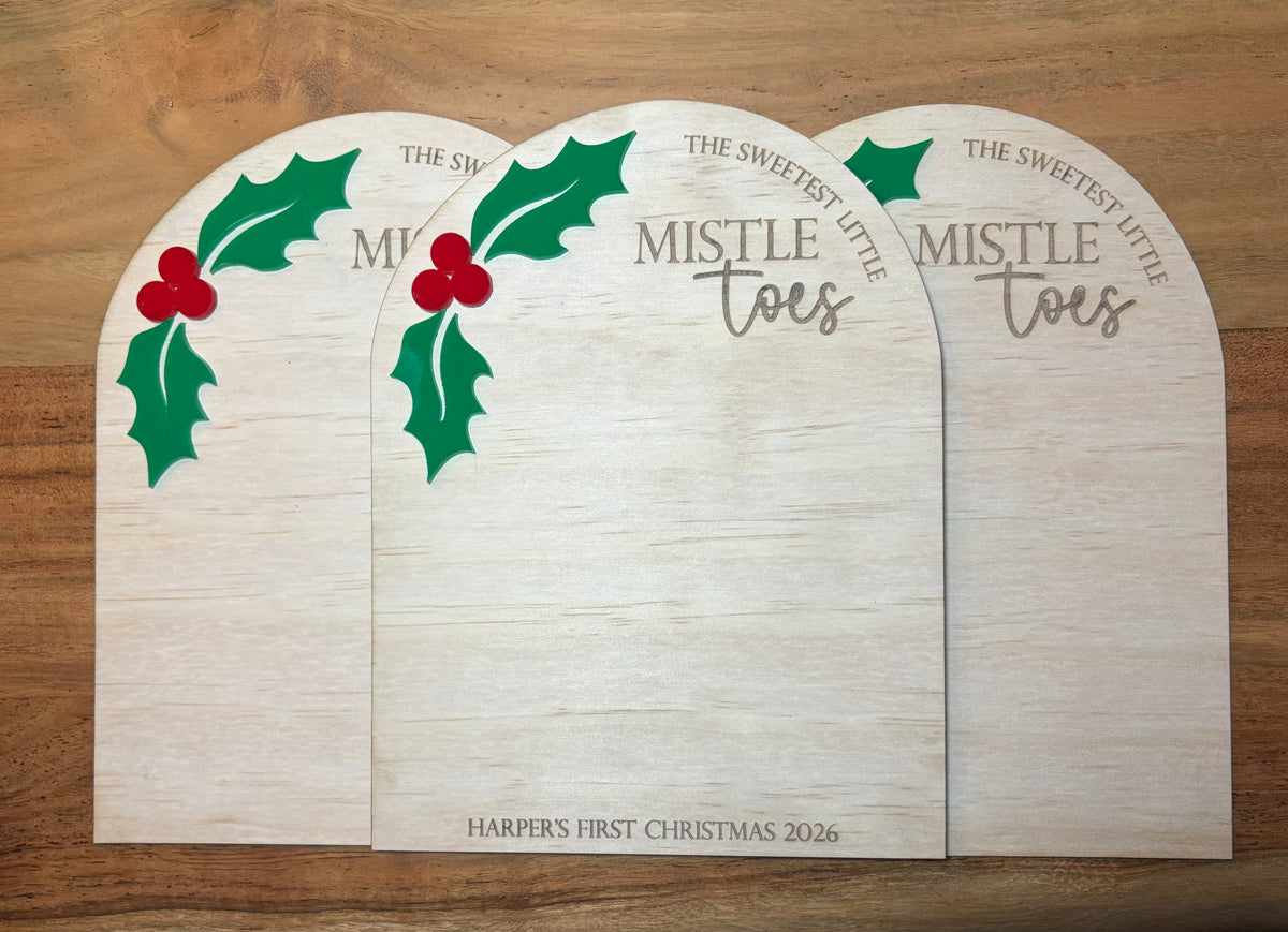 The Sweetest Little Mistletoes personalised baby's first Christmas footprint keepsake plaque with space for tiny footprints and child's name and year