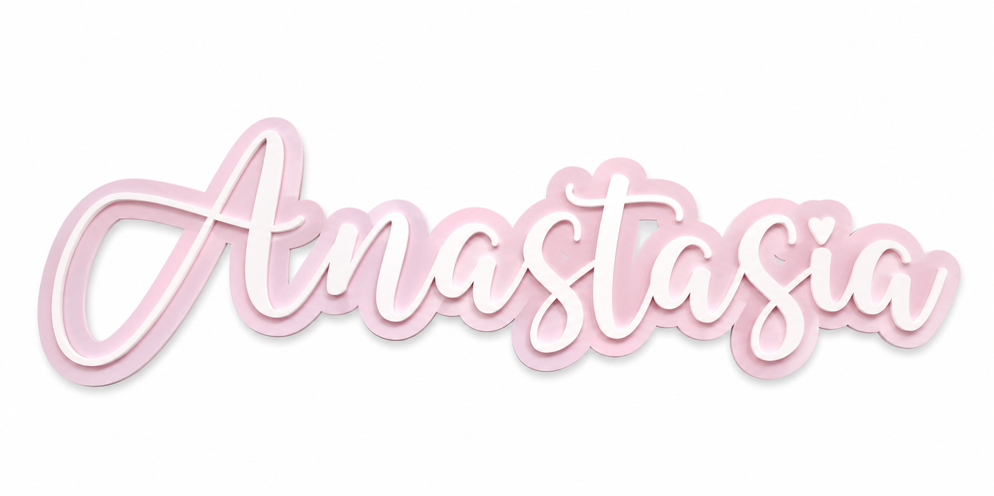 A pink cursive script nameplate reading 'Anastasia' on a plain white background.