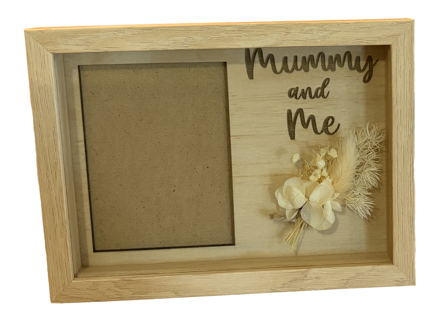 Wooden photo frame with 'Mummy and Me' engraving and floral decoration on a white background