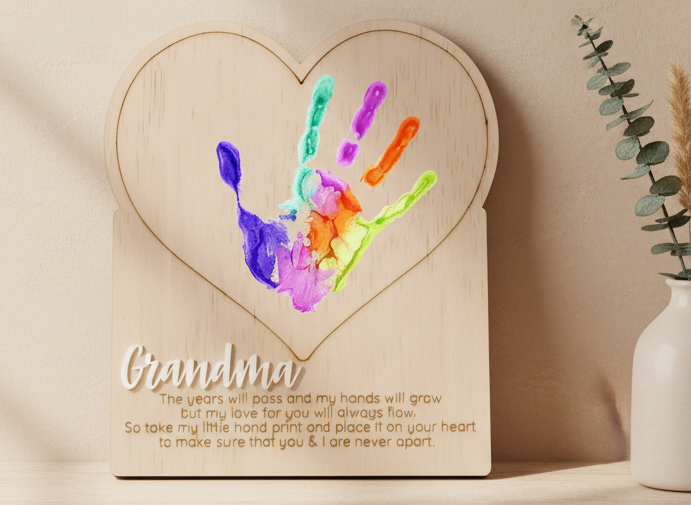 Handprint keepsake plaque laser engraved plywood close up
