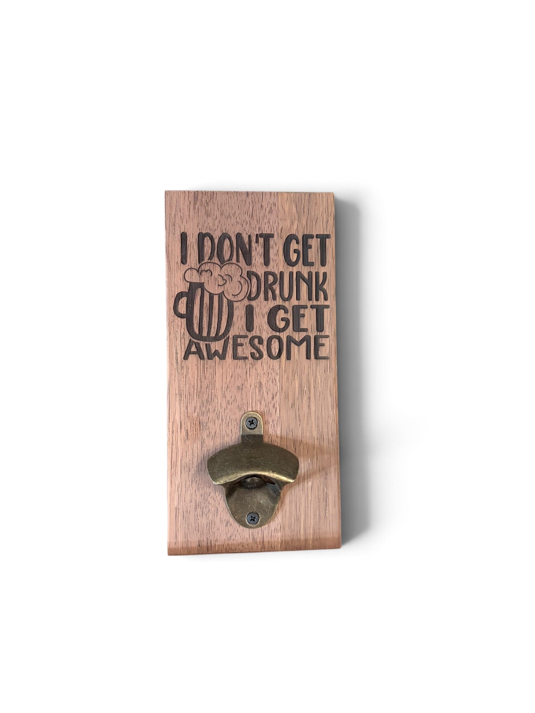 A rustic wooden wall-mounted bottle opener with the text 'I DON'T GET DRUNK I GET AWESOME' and a beer mug graphic, shown on a plain white background.