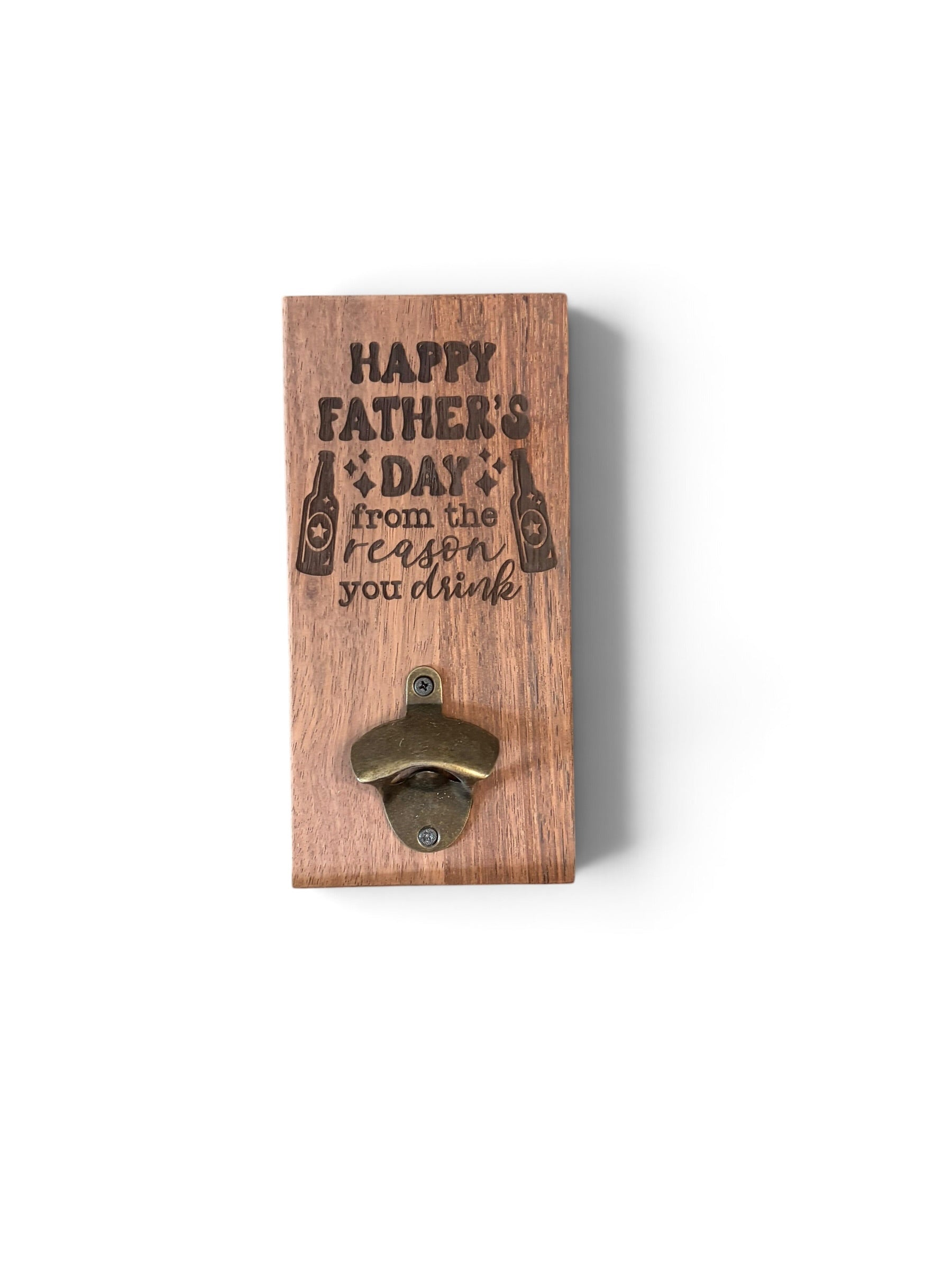 A wooden wall-mounted bottle opener with a printed 'Happy Father's Day from the reason you drink' design, shown against a plain white background.