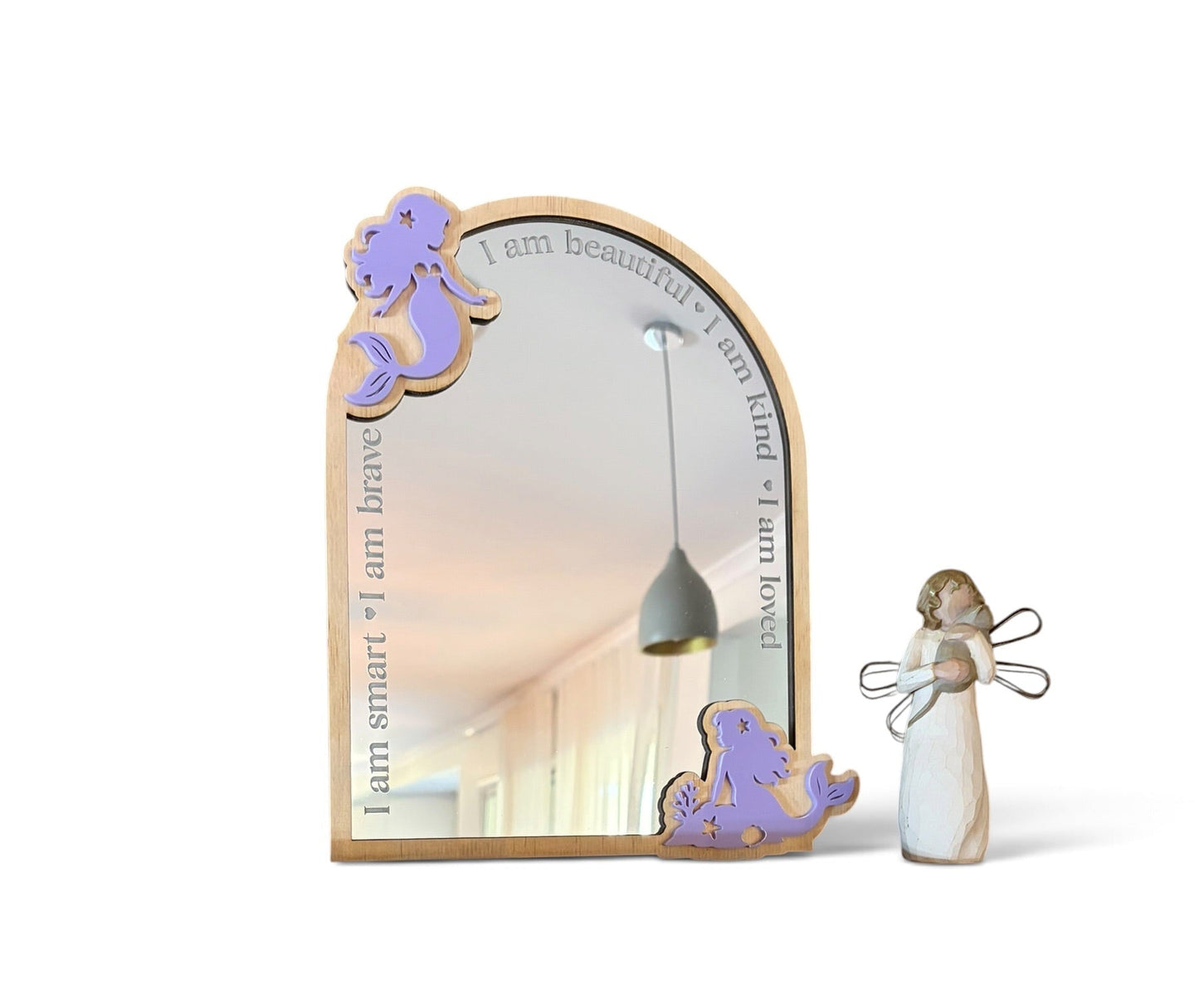 Wooden mermaid affirmation mirror with layered purple acrylic details and engraved positive affirmations for a child's bedroom.