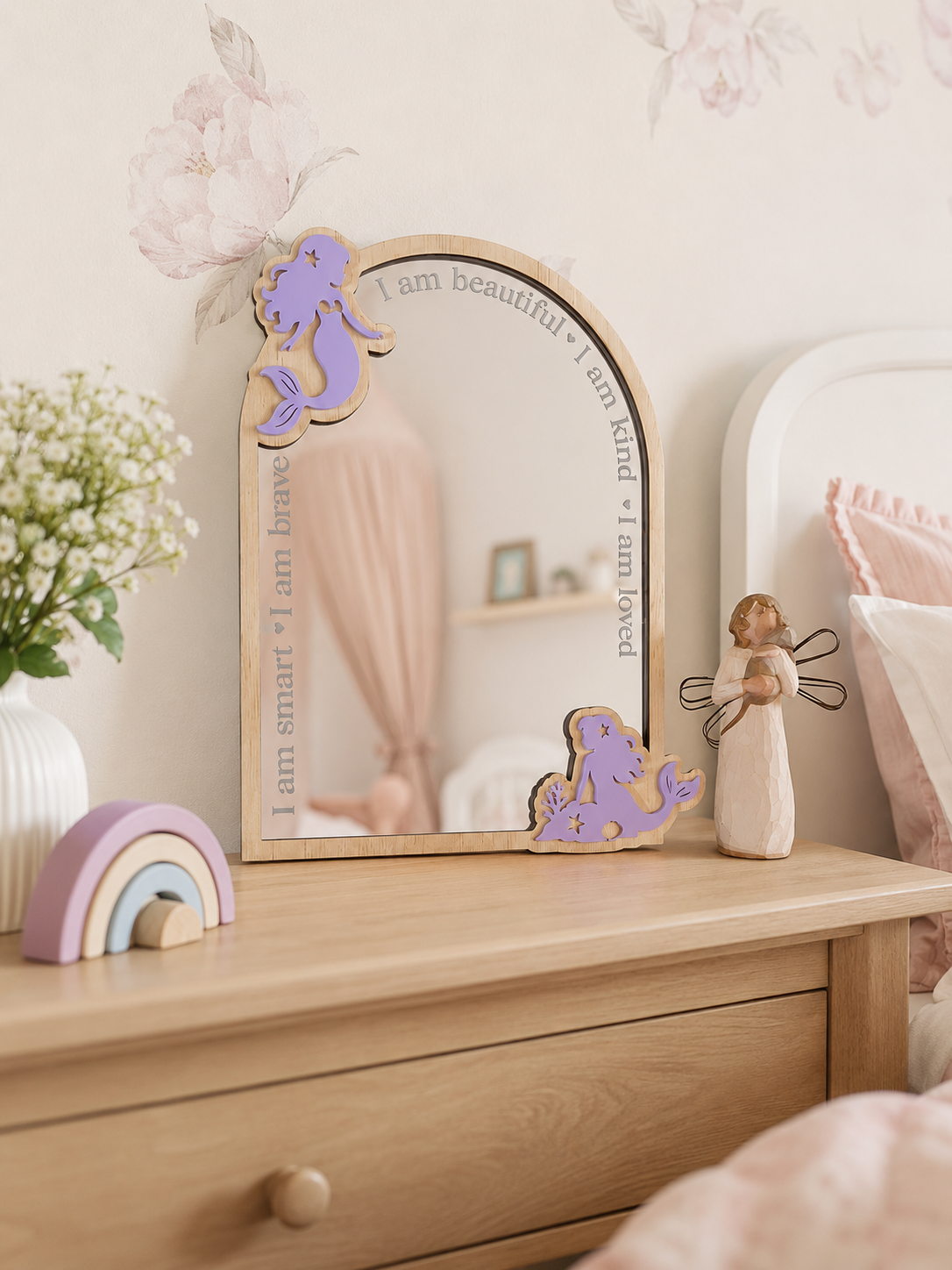 Wooden mermaid affirmation mirror with layered purple acrylic details and engraved positive affirmations for a child's bedroom.