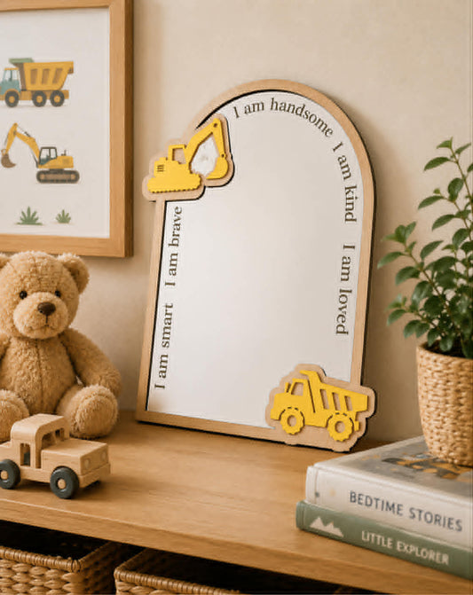 Personalised construction-themed acrylic affirmation mirror featuring an excavator, dump truck and engraved positive affirmations for a child's bedroom.