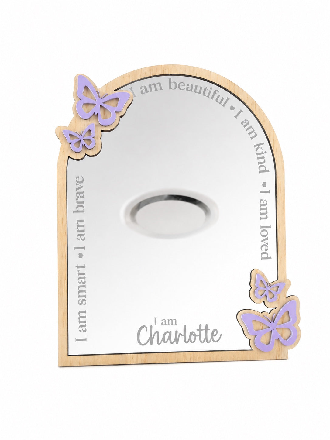 Personalised butterfly affirmation mirror made from plywood and mirrored acrylic featuring engraved positive affirmations and a custom name for a child's bedroom