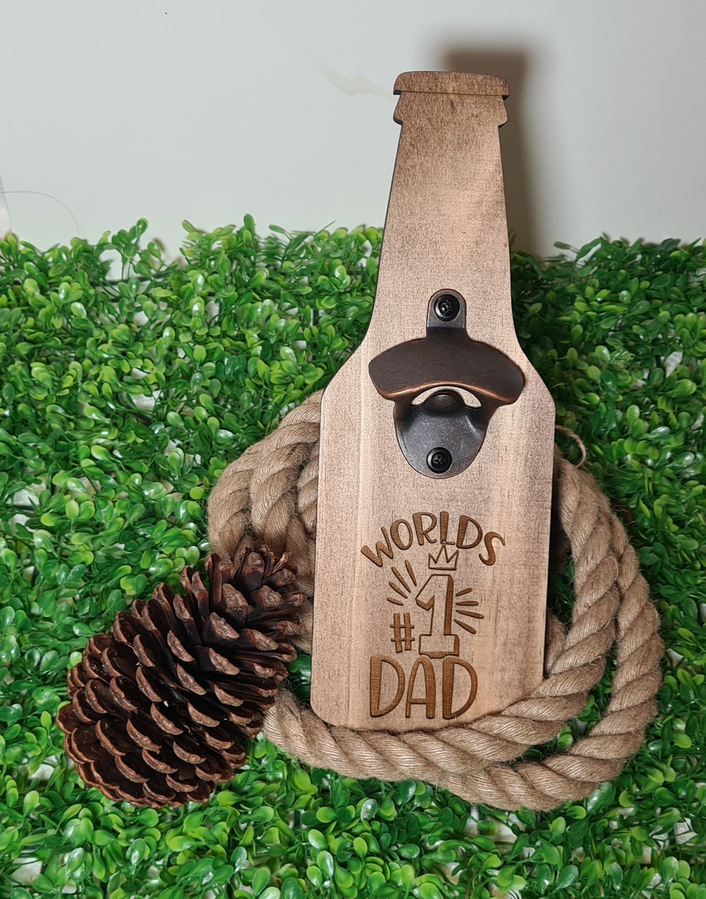 pine bottle shaped bottle opnener with engraved details daying WORLDS #1 DAD