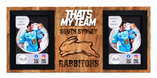 A custom wooden double-photo frame with black frames and a natural wood grain finish. The center features a laser-engraved rabbit silhouette and the text 'THATS MY TEAM SOUTH SYDNEY RABBITOHS'.