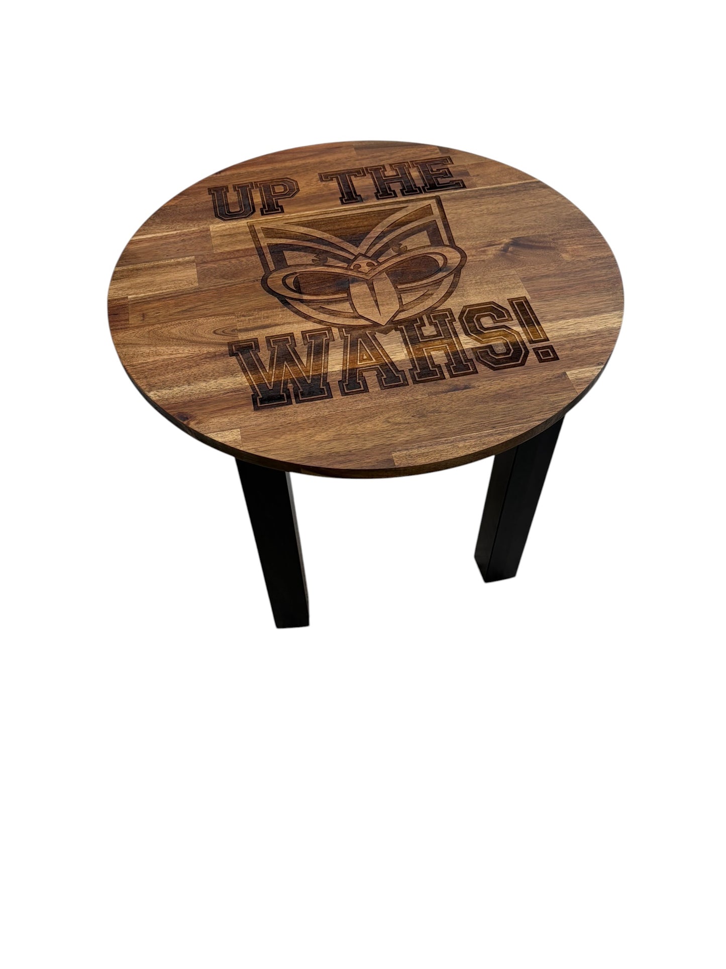 A round wooden end table with a dark brown wood grain top featuring a laser-engraved logo and the text 'UP THE WAHS!', supported by two black metal legs, shown on a plain white background.